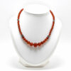 Collier en cornaline et perles décoratives en argent.